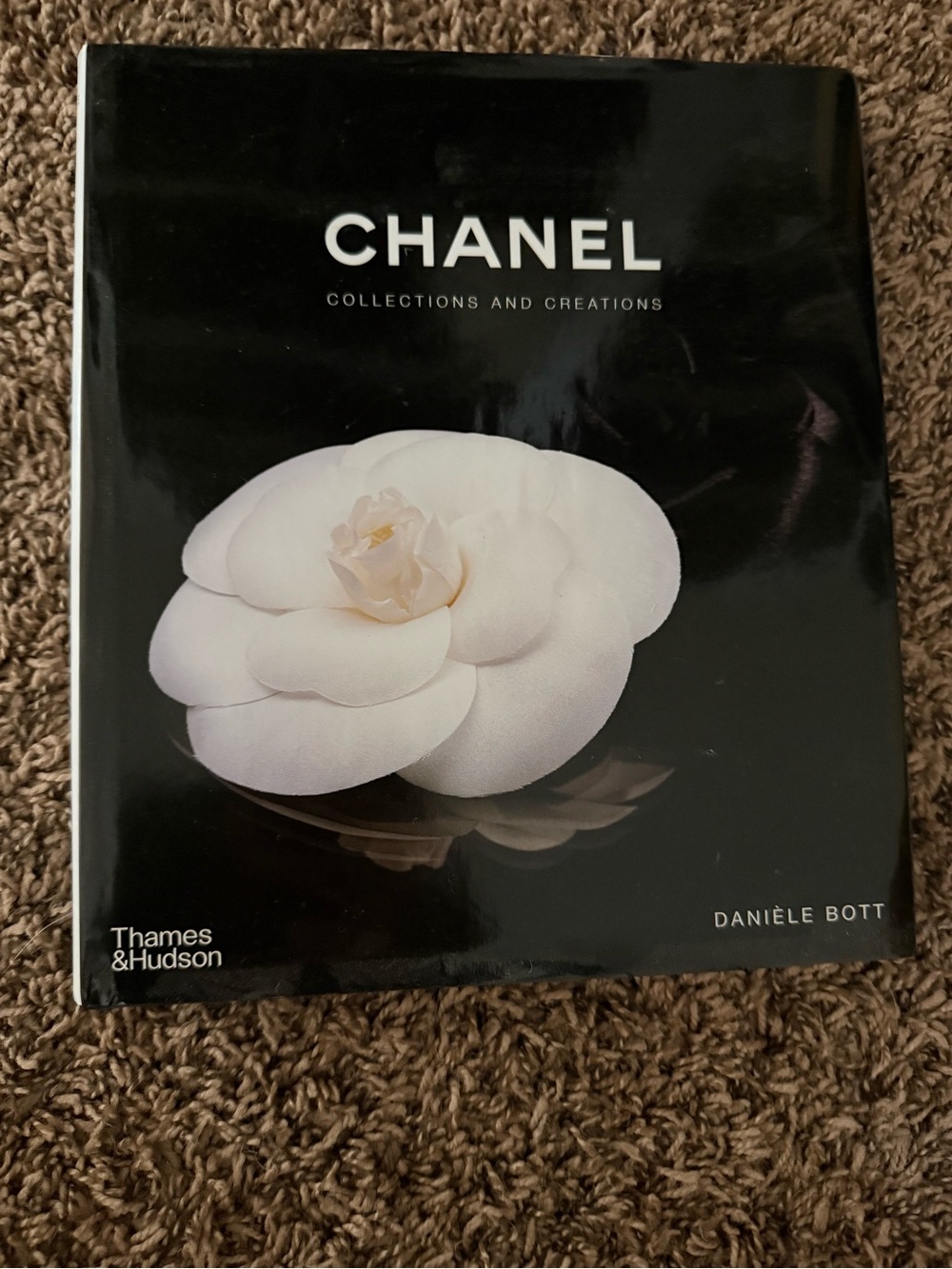 CHANEL Black Cover Coffee Table Book with White Camellia